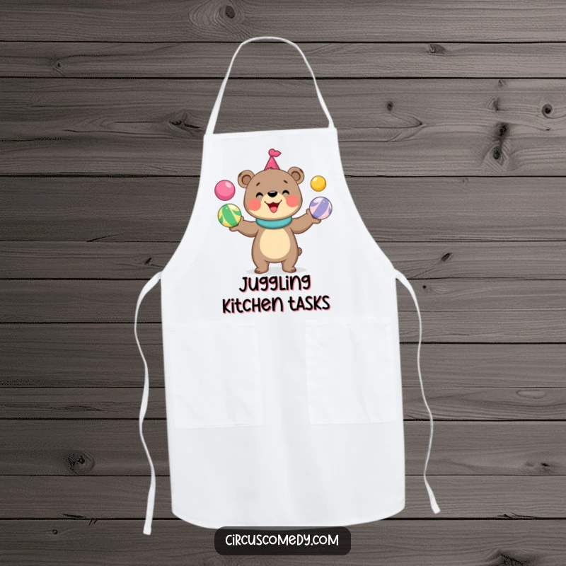 Funny bear apron showing a cute, grinning bear juggling colorful circus balls, bringing playful energy to kitchen tasks.
