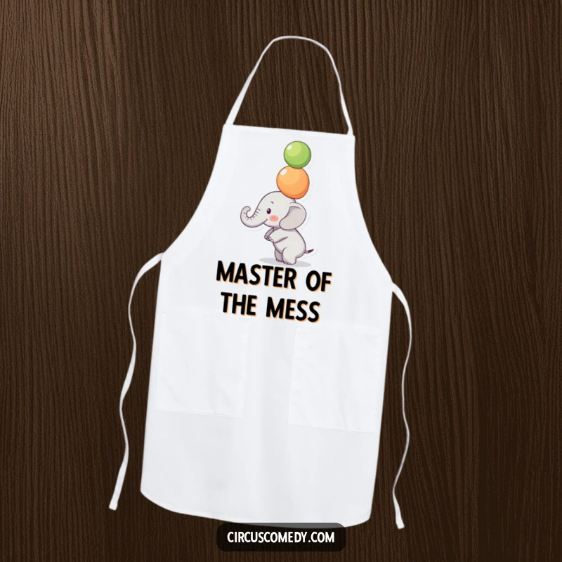 Funny Focused Elephant Apron: A small elephant balances colorful balls on its trunk with intense focus, a funny and functional kitchen accessory.