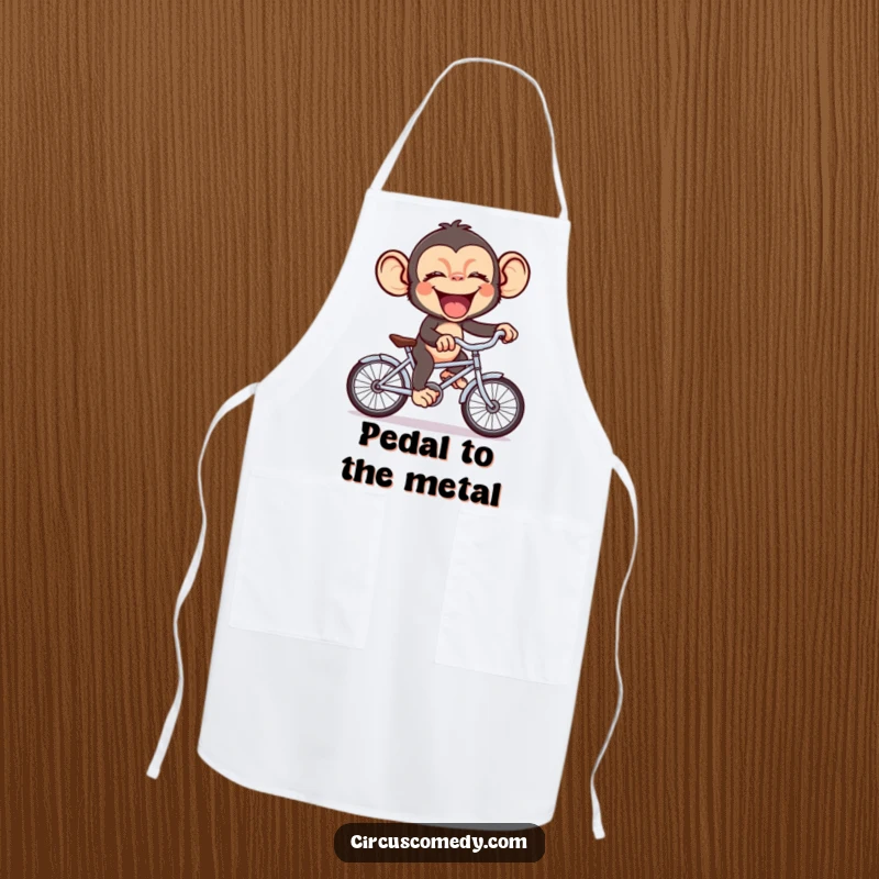 Funny chimp giggling while riding a tiny bicycle, a humorous and practical apron for kitchen fun and creativity.