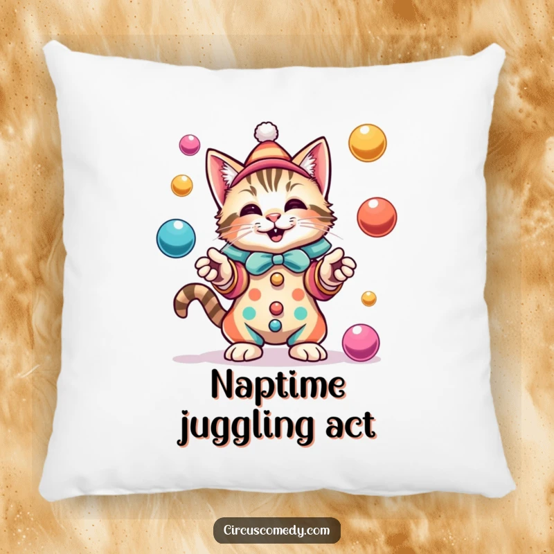 A plush pillow featuring a funny cat dressed as a clown, delightedly juggling colorful balls with a joyful demeanor.