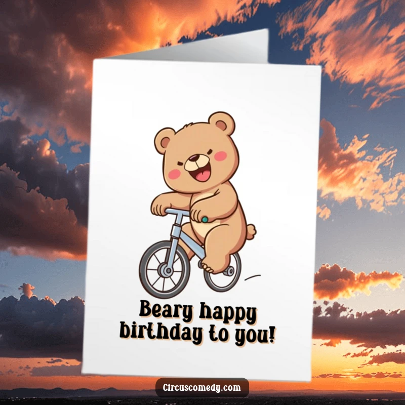 Funny Free Printable Bear Birthday Card: A determined bear with a huge smile balances perfectly on a unicycle, celebrating joyfully.
