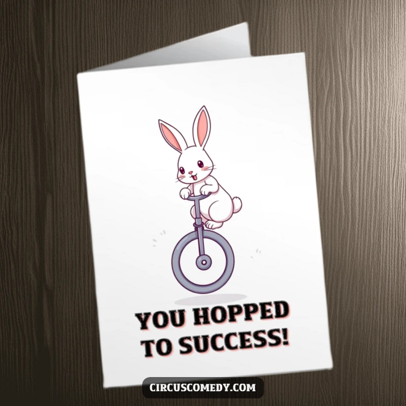 Funny Free Printable Congratulations Card: Rabbit skillfully balances on a unicycle, ears perked in a triumphant pose.