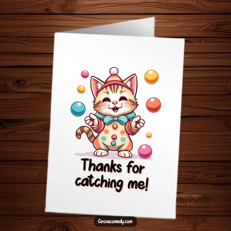 Funny Free Printable Thank You Card: Cat wearing a clown costume juggles balls with a delighted expression.