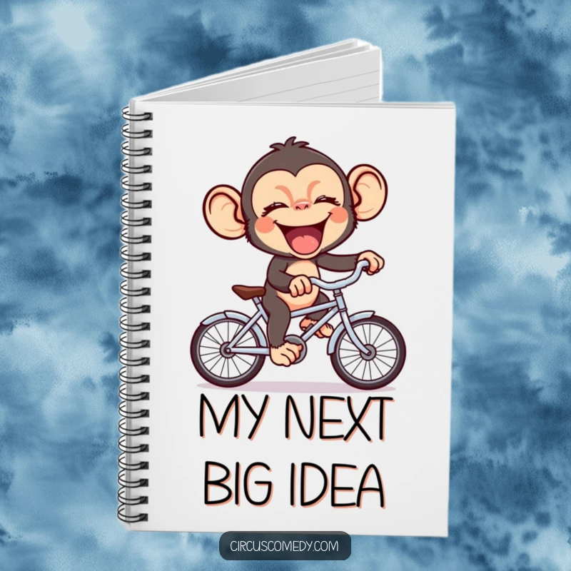 Funny chimp in stitches riding a tiny bicycle, inspiring witty notes and creative thoughts in this humorous notebook.