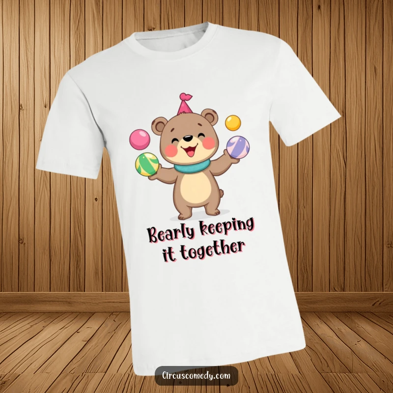 Funny bear t-shirt showcasing a cute, happy bear artistically juggling brightly colored circus balls with a contagious grin.