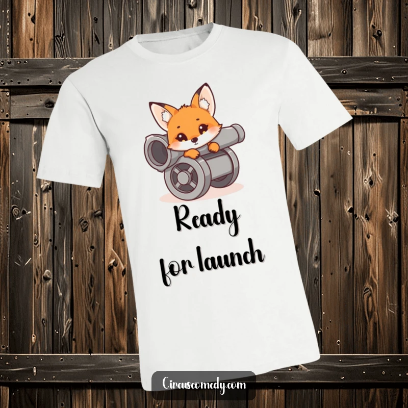 Funny curious fox peeking from the muzzle of a cannon, ready for action or a mischievous adventure, on a t-shirt.