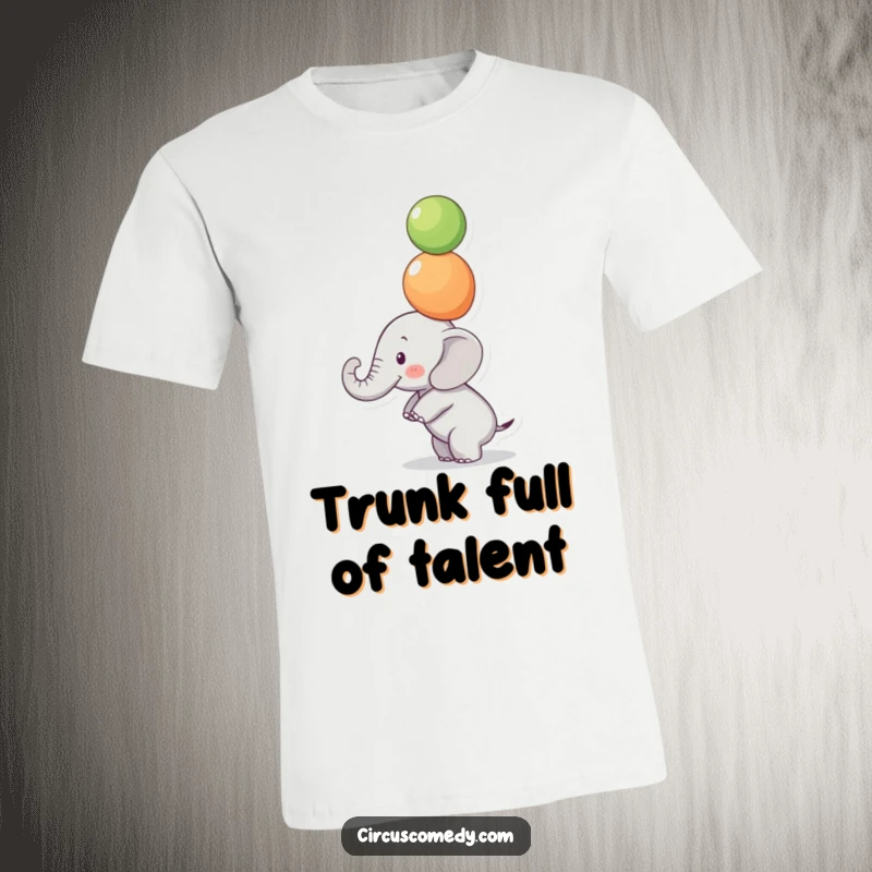 Funny Focused Elephant T-Shirt: A small elephant balances colorful balls on its trunk with intense focus, perfect for a funny gift.