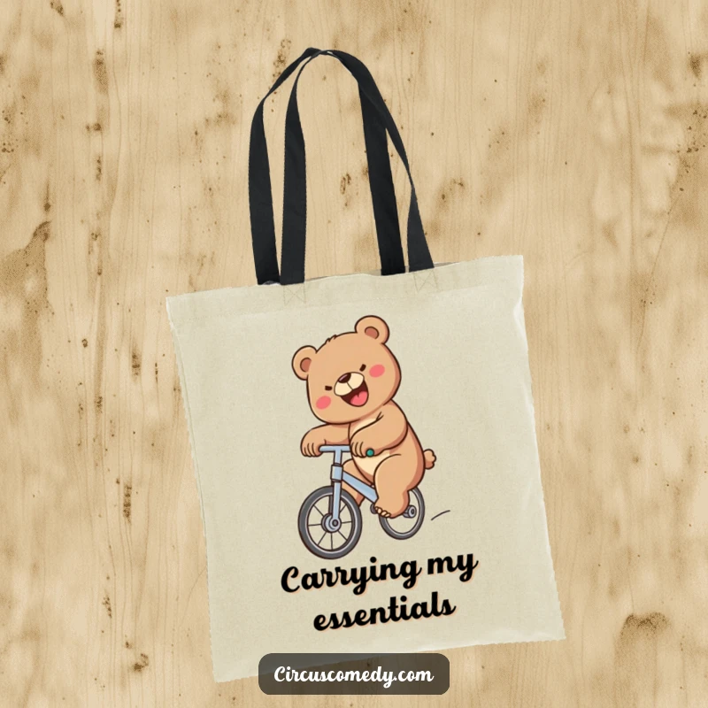 Funny Bear Unicycle Tote Bag showcasing a happy bear balancing on a unicycle, perfect for carrying items with a dose of humor, a funny gift.
